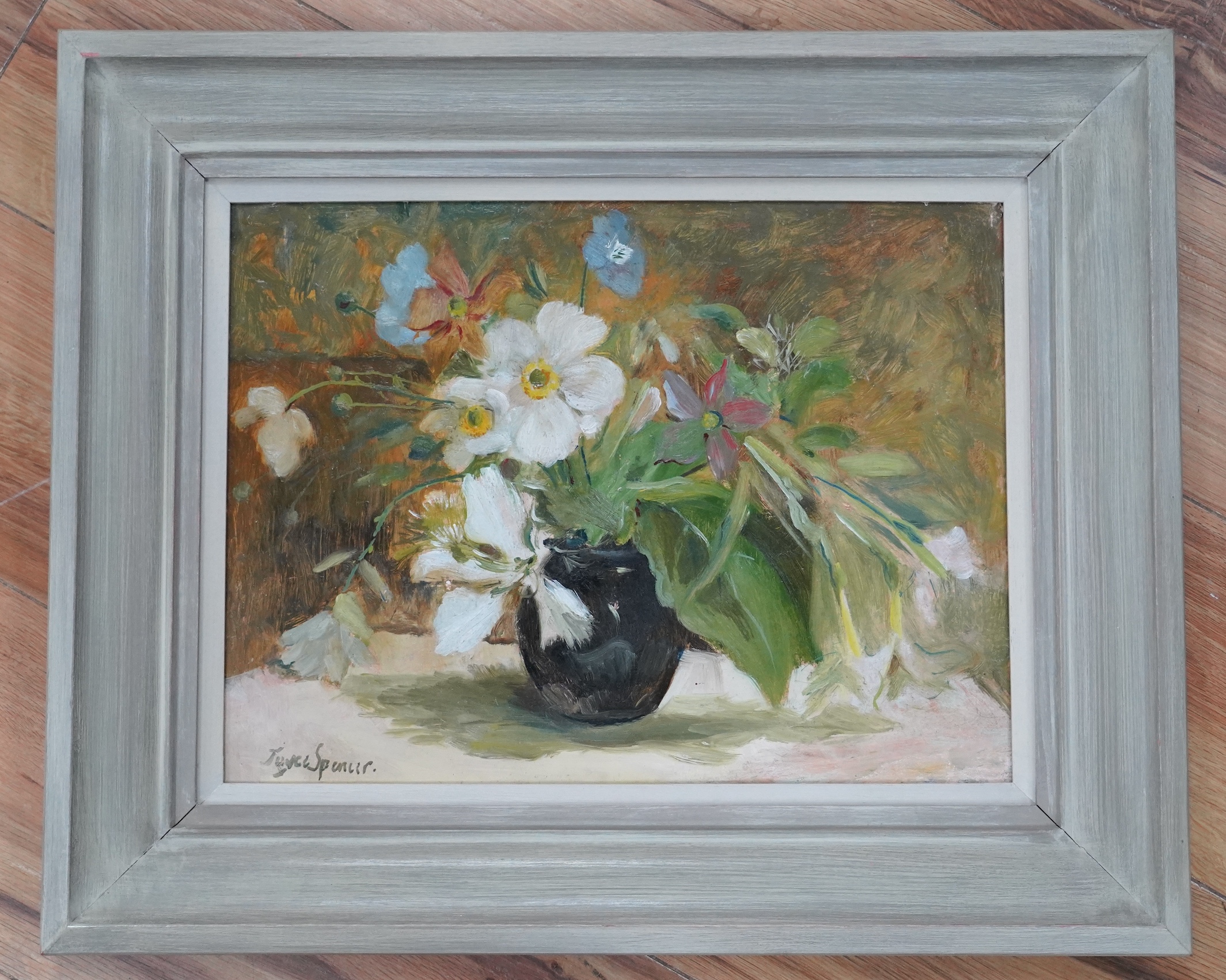 Joyce Spencer (b.1923), oil on board, Still life of flowers in a vase, c.1950, signed, inscribed label verso, 28 x 37cm